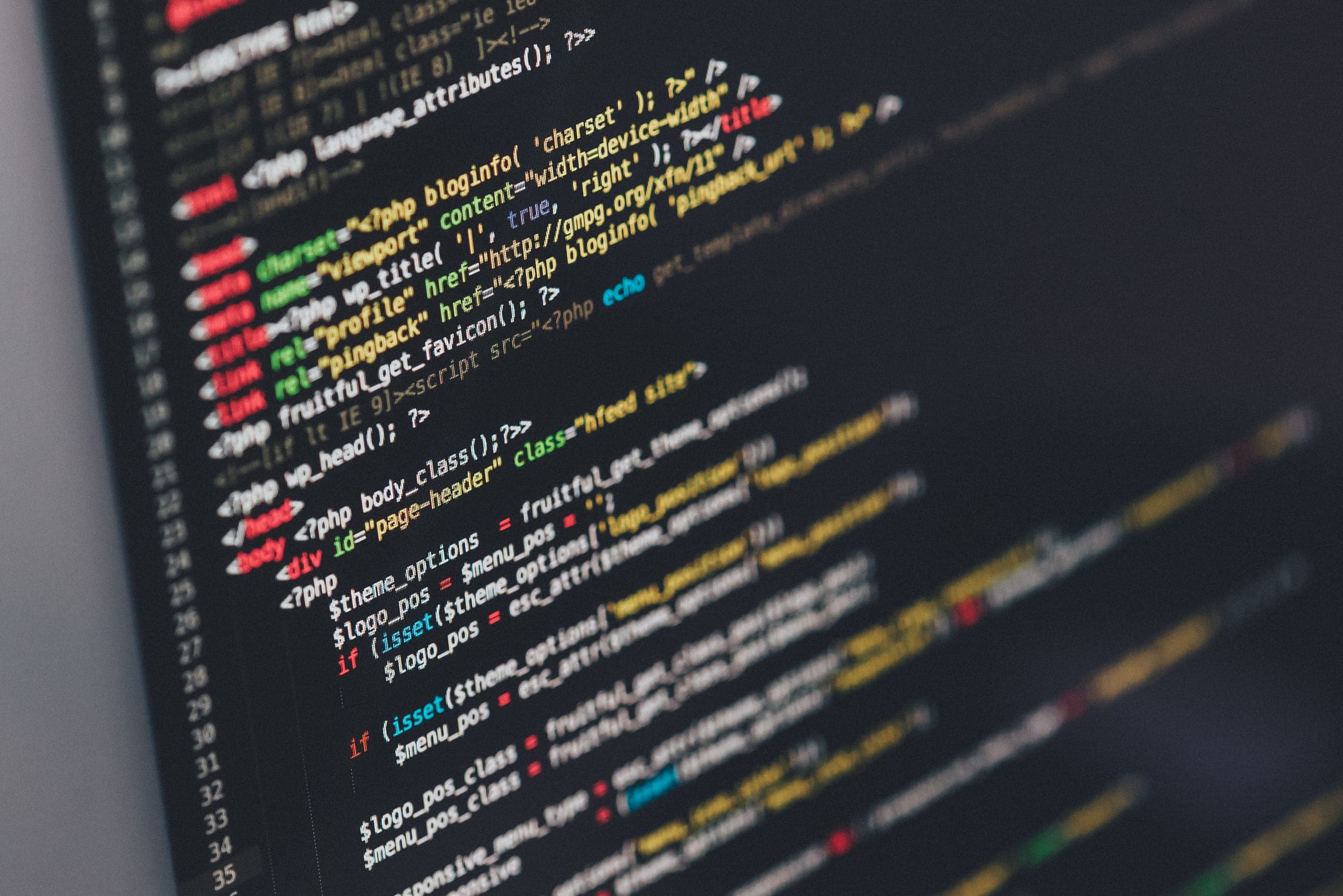 Lines of colour-highlighted source code on a dark code editor screen